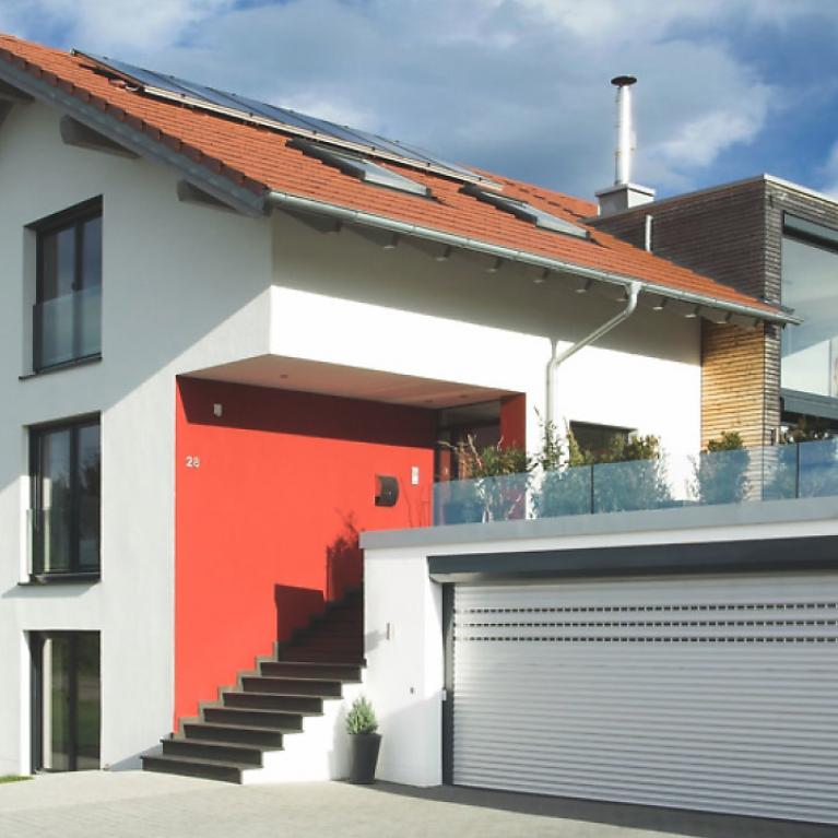 Porte à enroulement ROLENTO - Maison individuelle Sulzberg Maison individuelle Sulzberg avec porte à enroulement ROLENTO